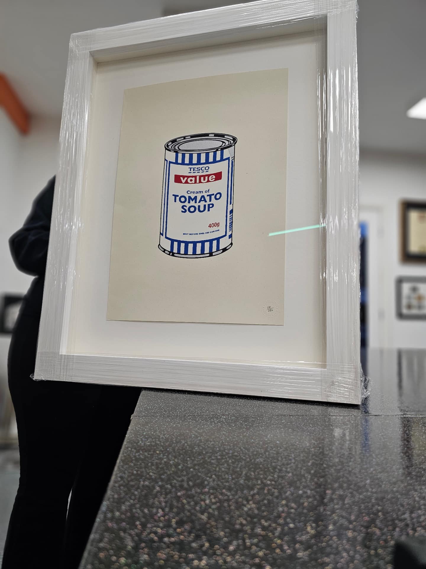 Inside The Art Shop at Love To Frame Manchester — fine art prints and framed work on the studio wall