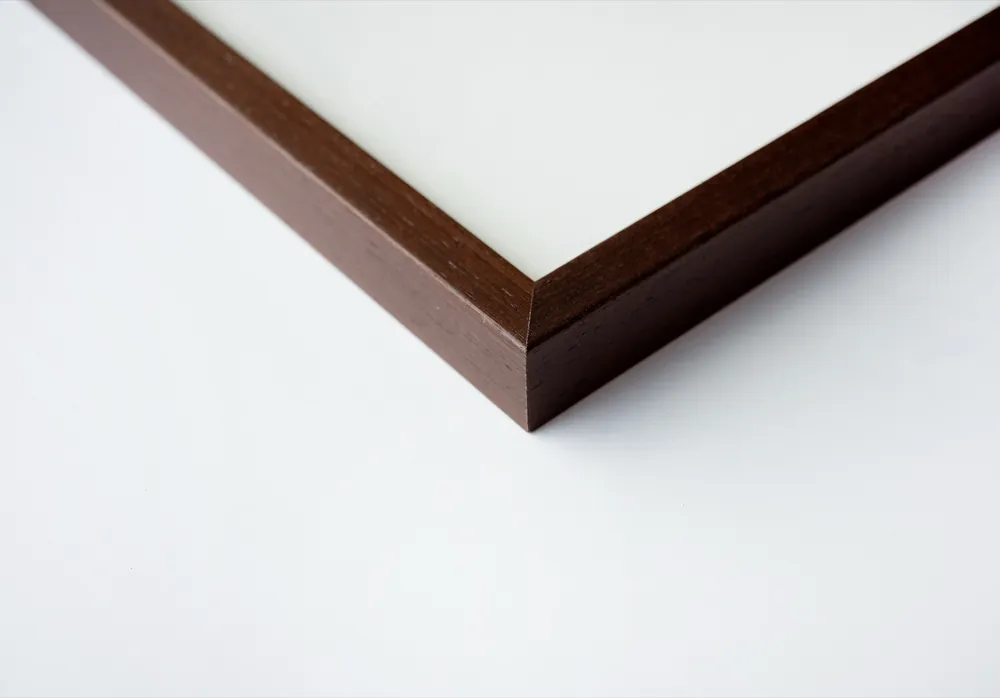 Mitred corner of a Nielsen Quadrum solid wood frame in wenge