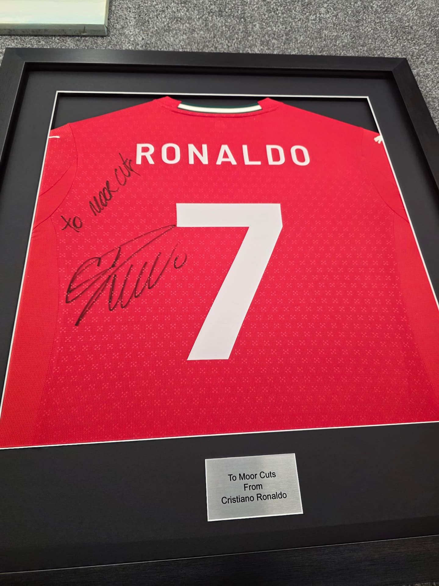 Framed sports memorabilia 9